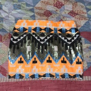 Sequin Aztec/boho style mini skirt. Only worn to a UT football game once.
